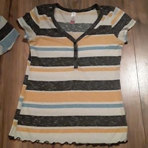 2 multi colored striped shirts